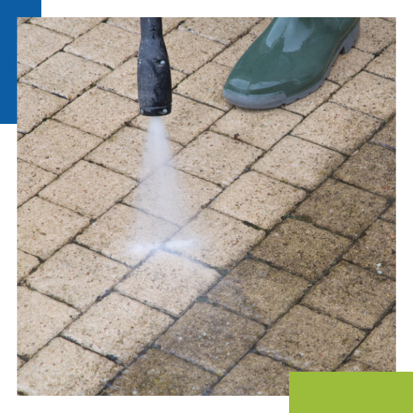 technician pressure washing driveway technician pressure washing driveway