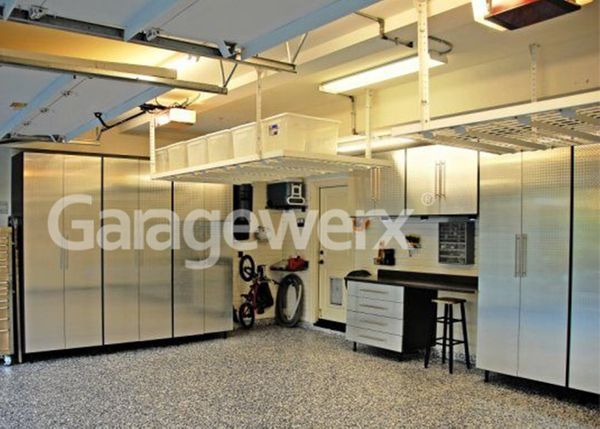 Overhead storage racks installed in garage