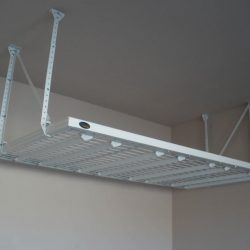 Overhead storage rack installed in garage