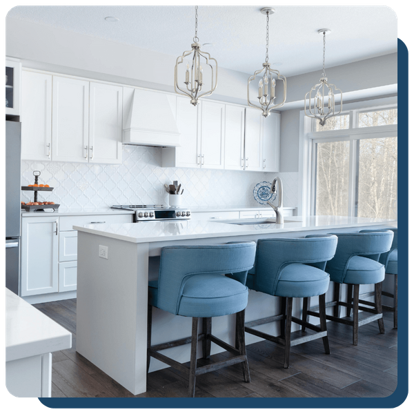 newly remodeled kitchen with white countertops and white cabinets