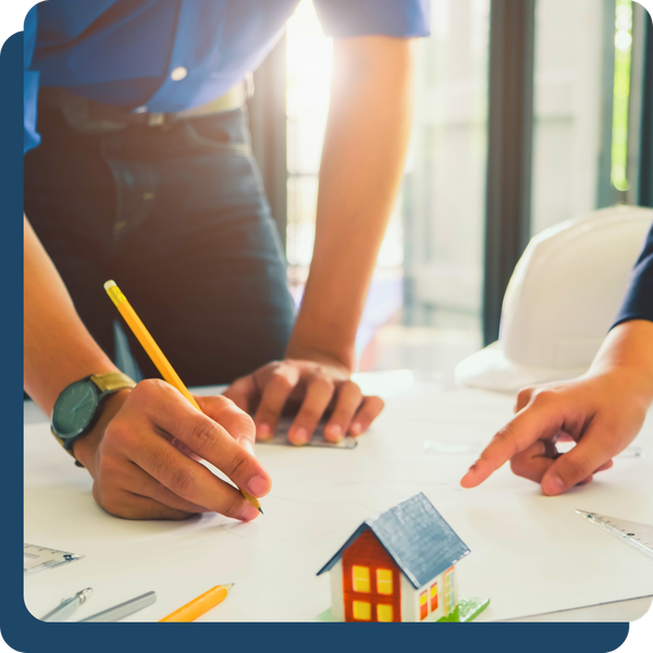contractors looking over building plans