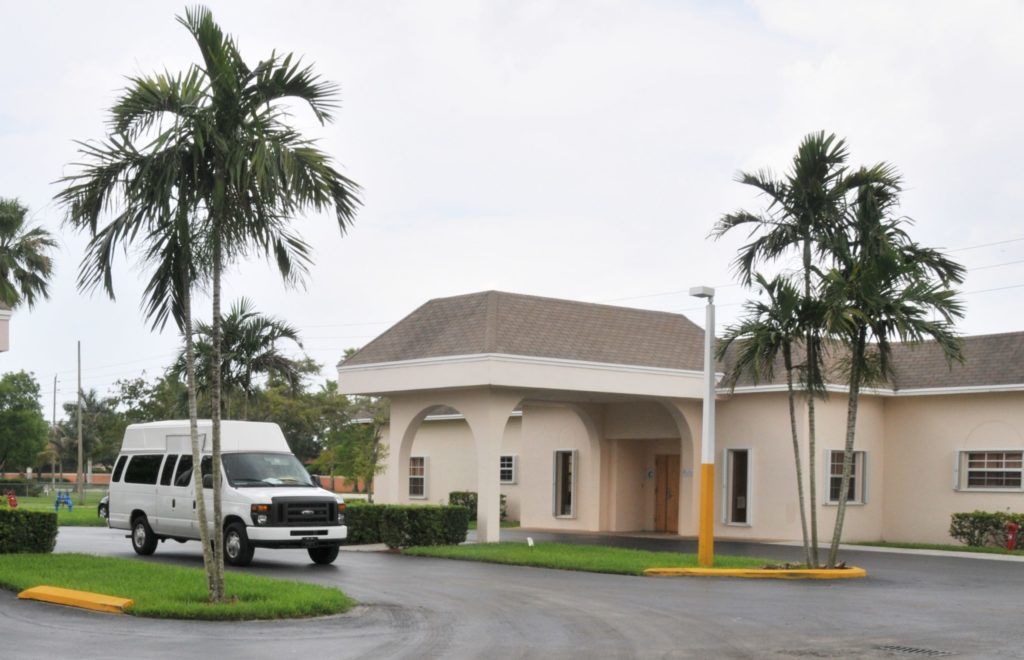 houseoutside-with-van-scaled-e1646683958697-1024x660.jpg
