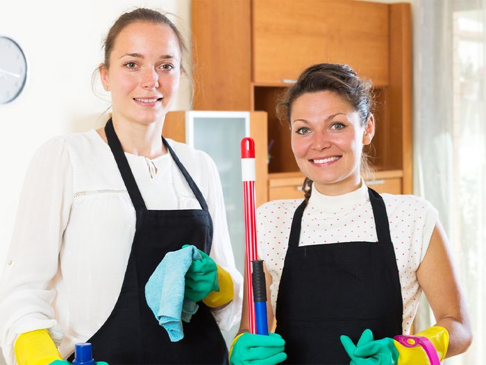 2 housekeepers smiling