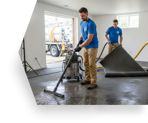 crew extracts water and removes carpet from commercial space 