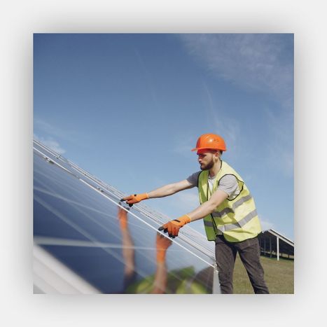 technician installing solar panel technician installing solar panel