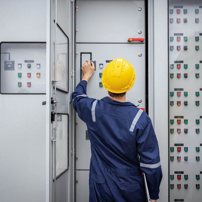 man at control panel