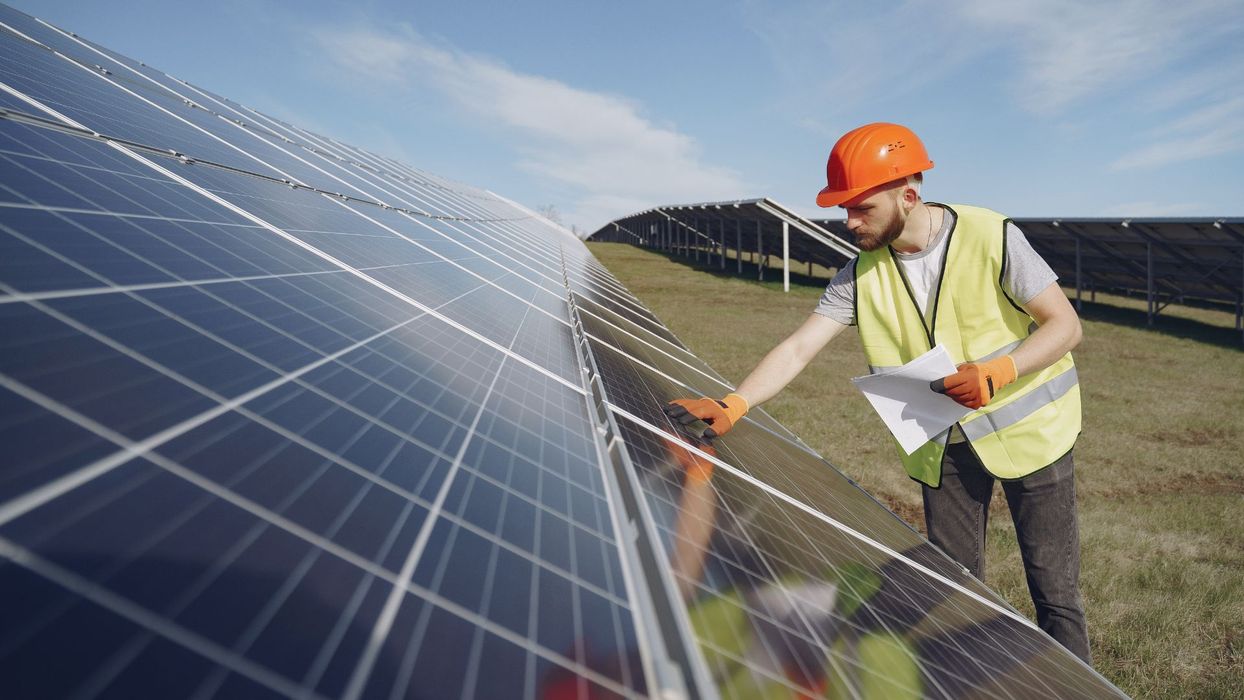 inspecting solar panel