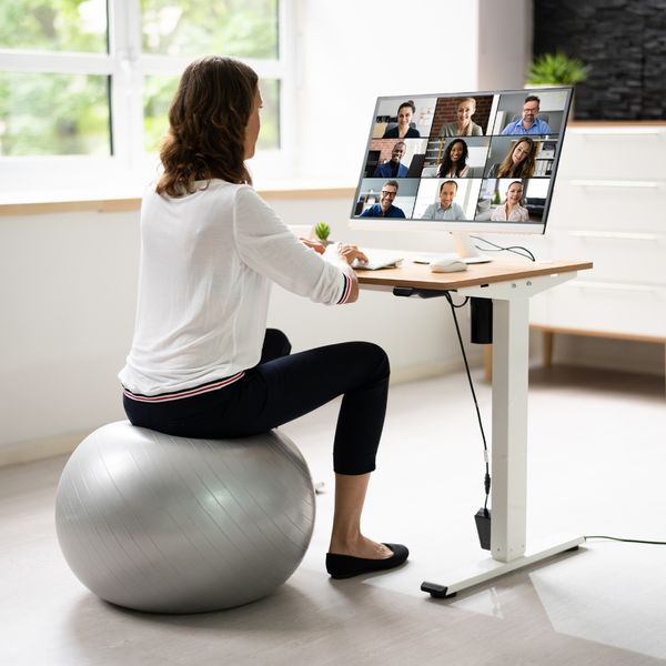 image of a woman sitting on a exercise ball