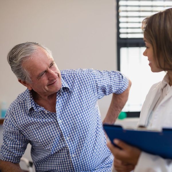 man receiving chiropractic consultation