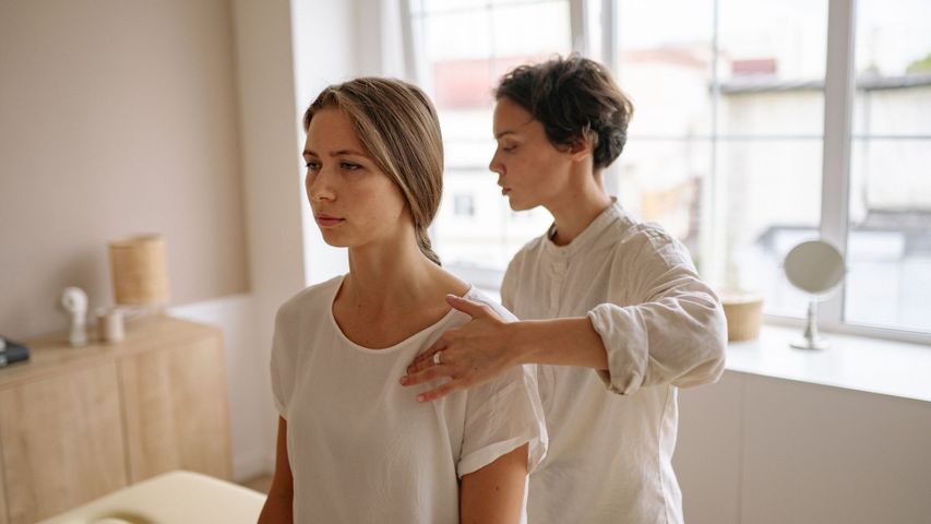 woman receiving a chiropractic adjustment for a work injury