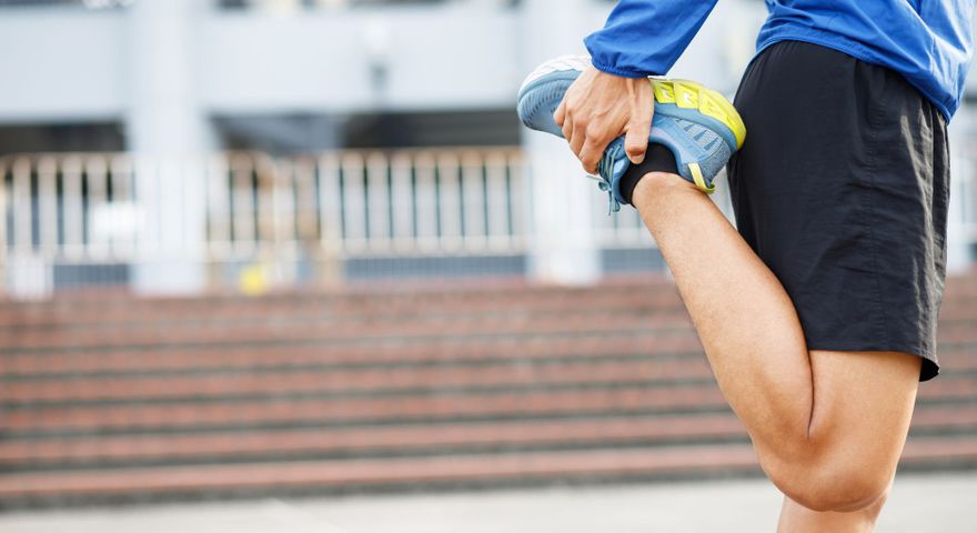 Athlete stretching.