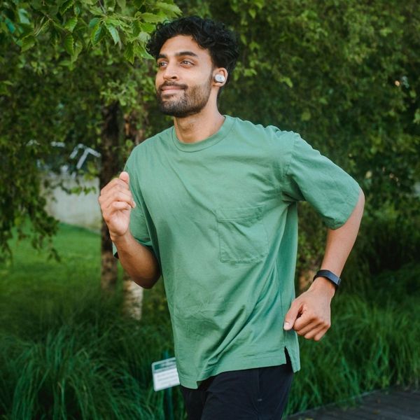 happy man running outdoors
