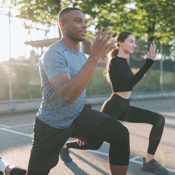 man and woman lunging