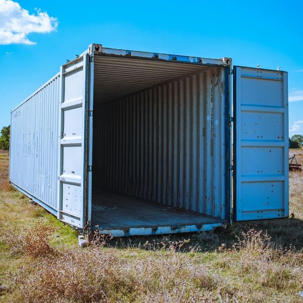 open container in prairie field