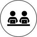 2 people using computers icon