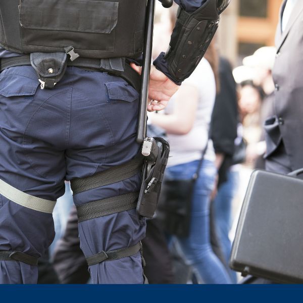 up close view of an armed security guard up close view of an armed security guard