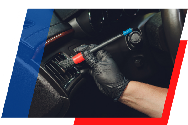 cleaning a air vent with a brush