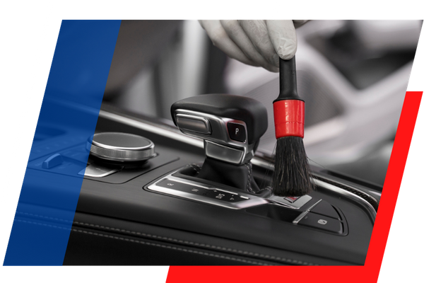 cleaning a shifter with a brush