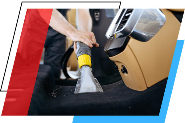 vacuuming the interior of a car