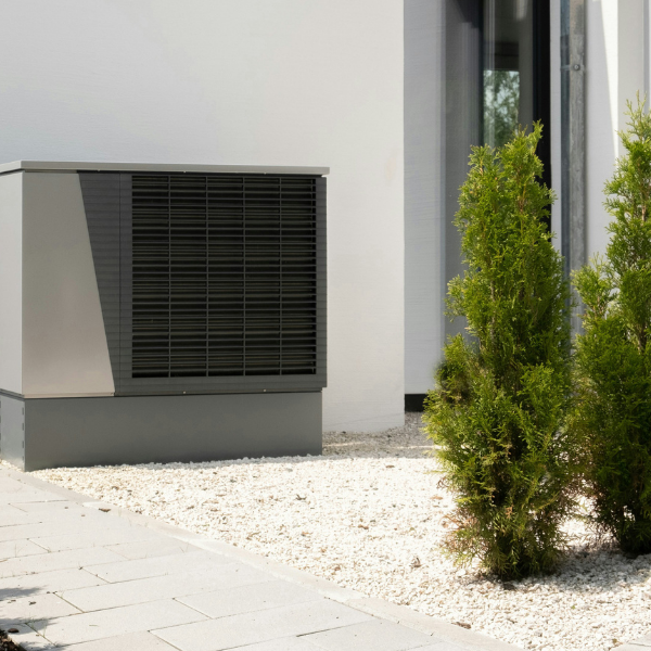 modern, boxy AC unit outside house