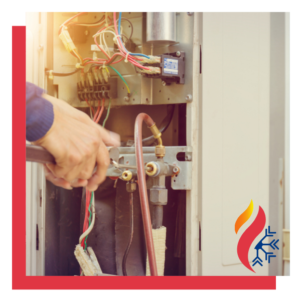 technician repairing HVAC system technician repairing HVAC system