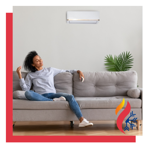 woman sitting underneath air conditioner woman sitting underneath air conditioner