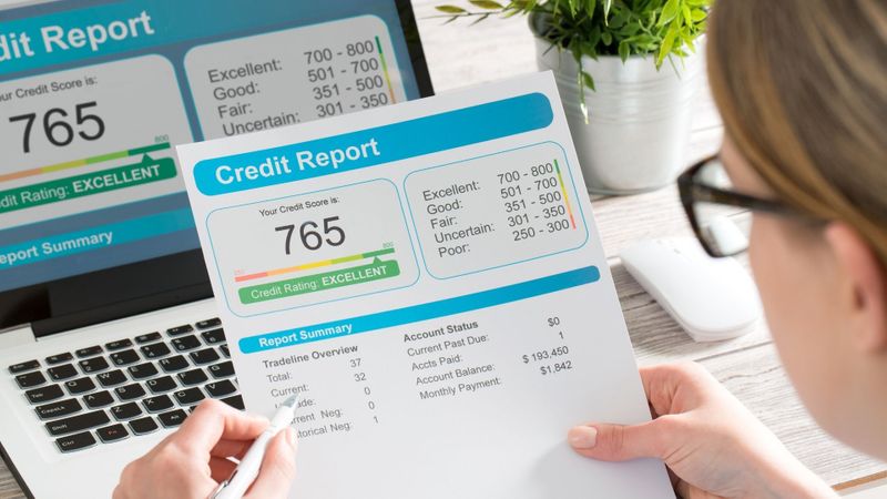 woman looking at her credit score