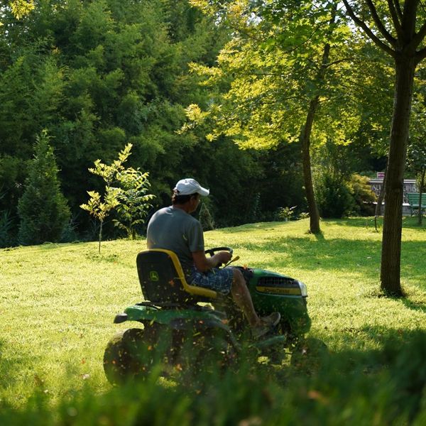 person mowing