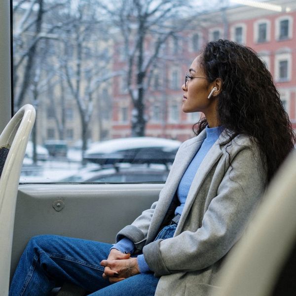 woman riding on a bus