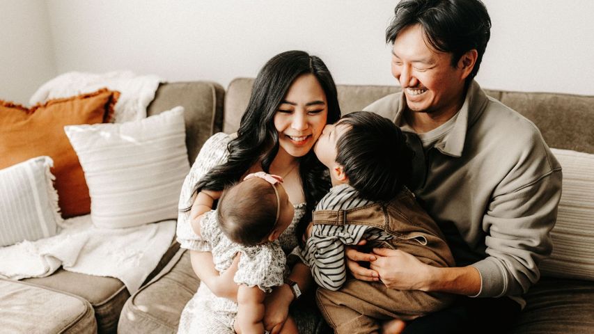 family sitting on a couch together