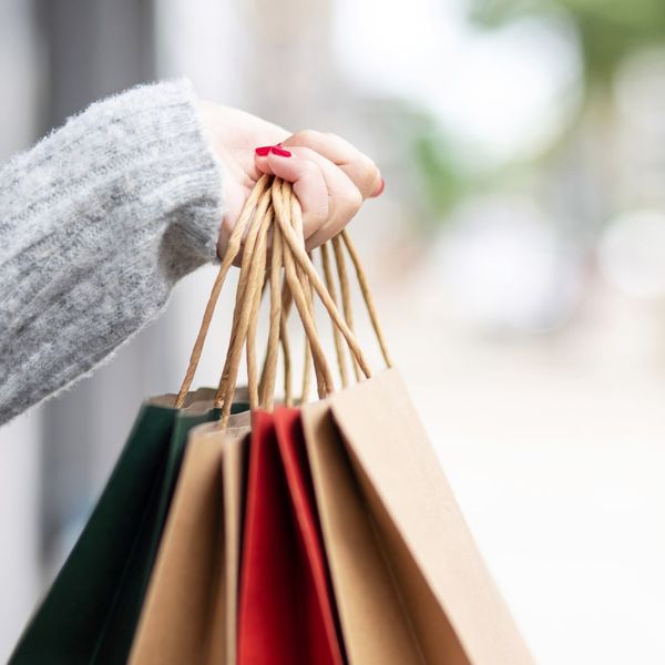 woman holding shopping bags