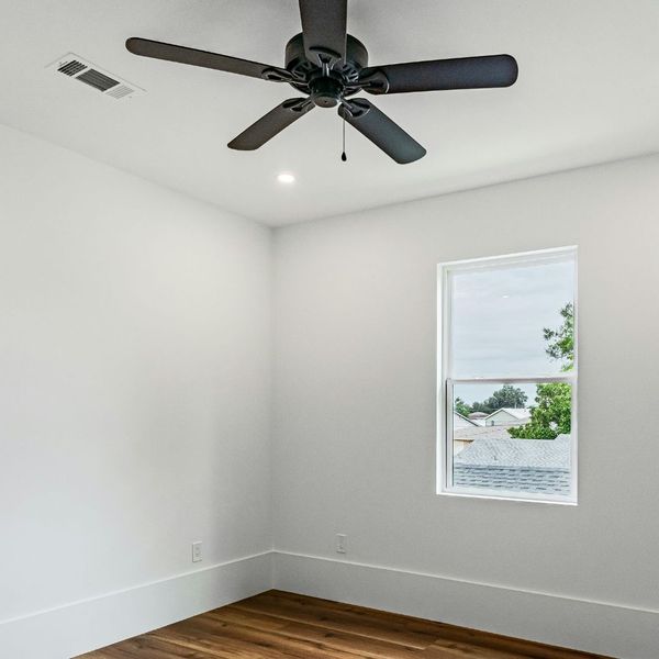room with a ceiling fan room with a ceiling fan
