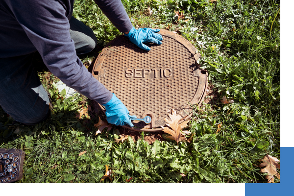 Hands in gloves closing septic line