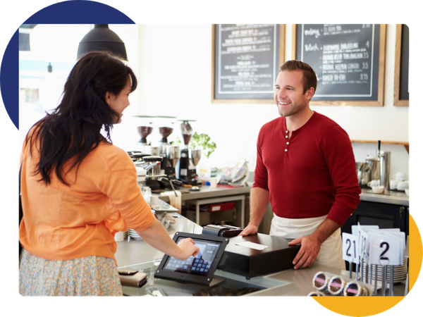 customer paying in coffee shop