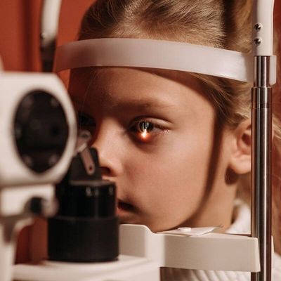 child getting an eye exam child getting an eye exam