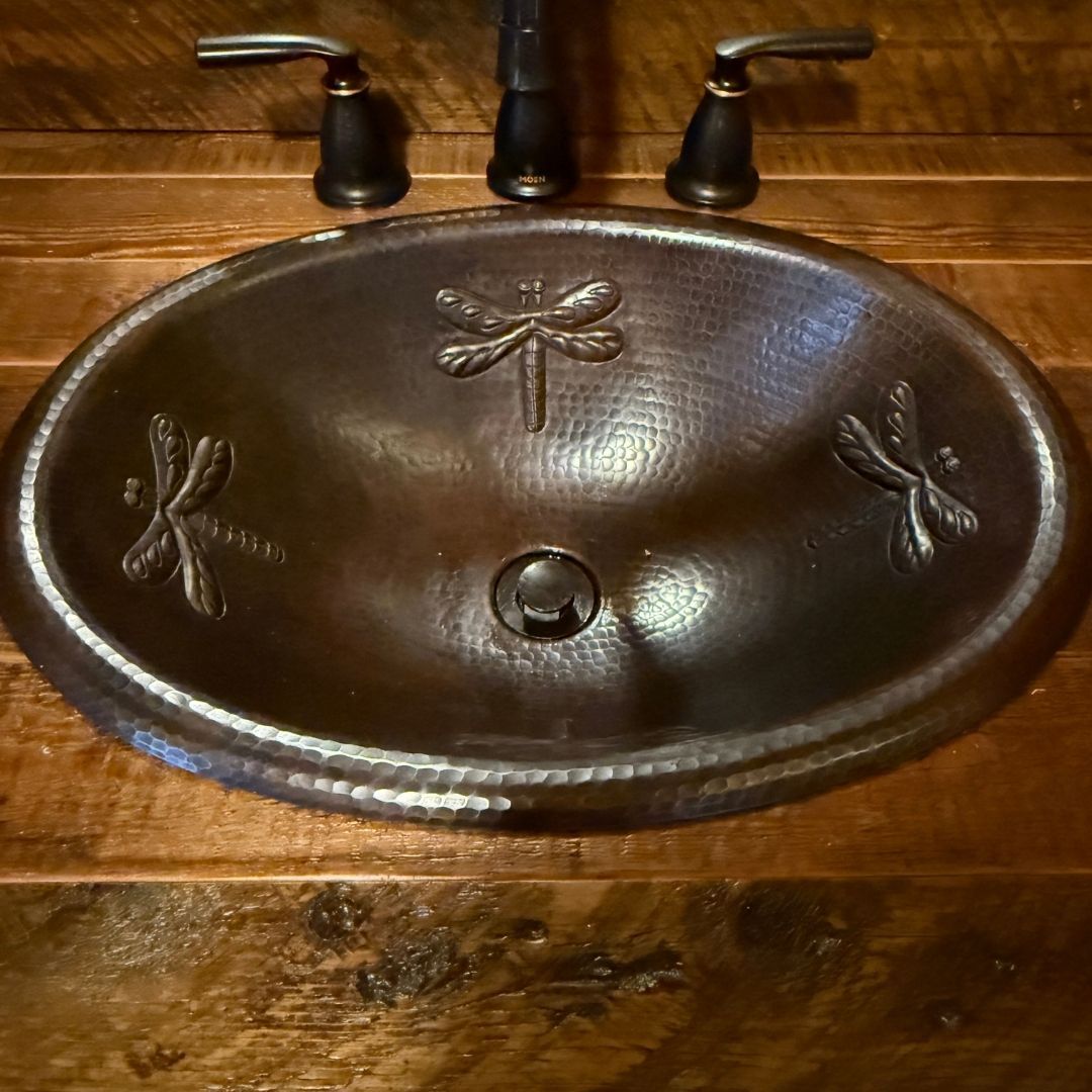Close-up of a renovated copper cabin sink Close-up of a renovated copper cabin sink