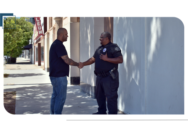 shaking hands with a security guard