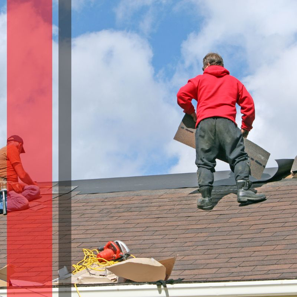 roofers repairing a roof