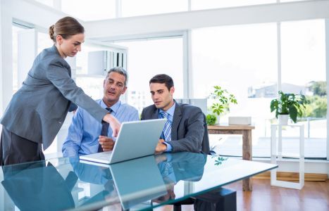 employees being trained on computer