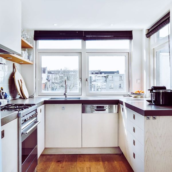 small kitchen with bright windows