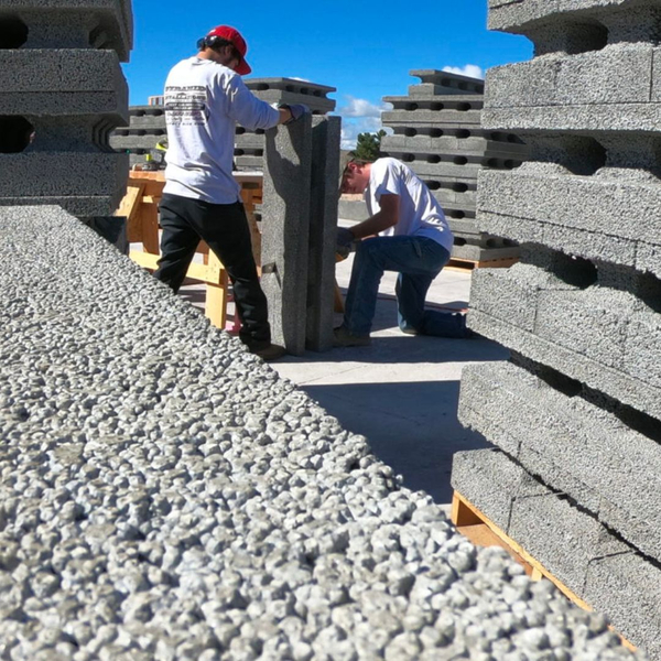 workers cutting a perfect block to size