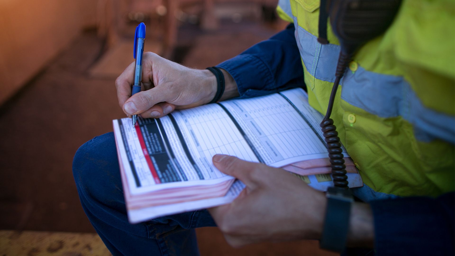 Construction worker filling out a safety audit
