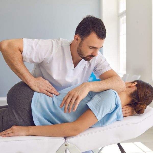 chiropractor and patient