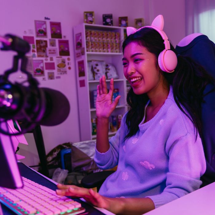 female gamer wearing headphones