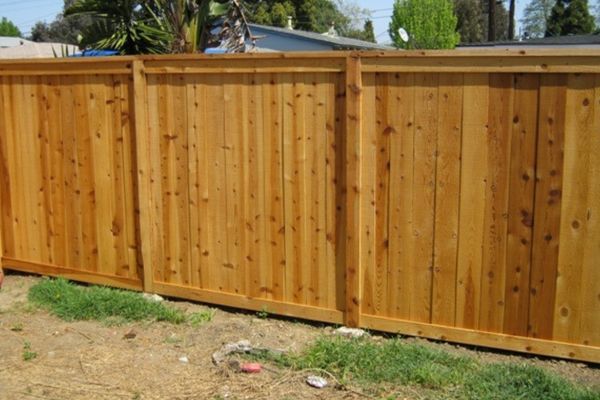 Cedar wood fence boulder
