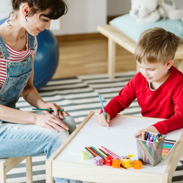 boy drawing at ABA therapy