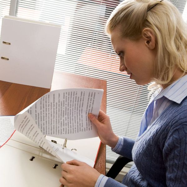 woman inspecting paperwork