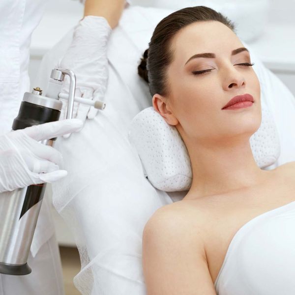 A woman undergoing cryotherapy treatment. A woman undergoing cryotherapy treatment.