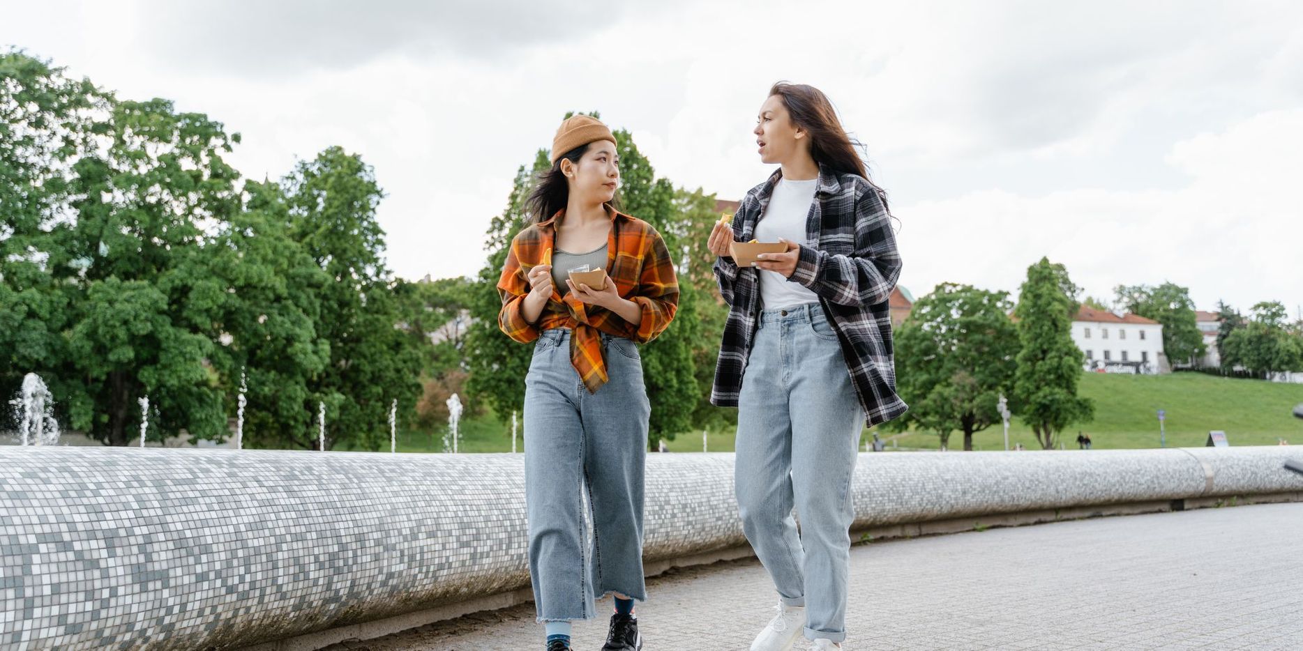 women walking while eating