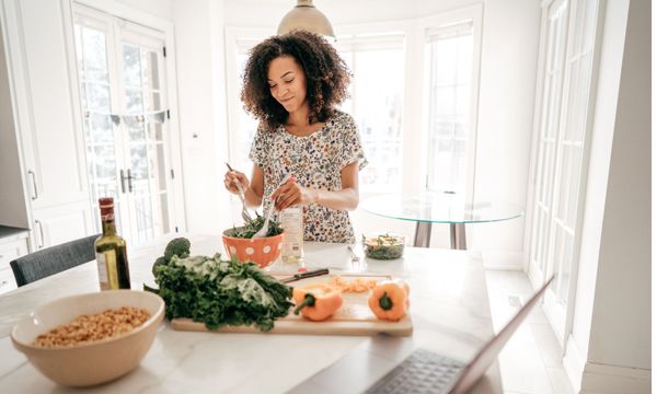 a woman making a healthy meal